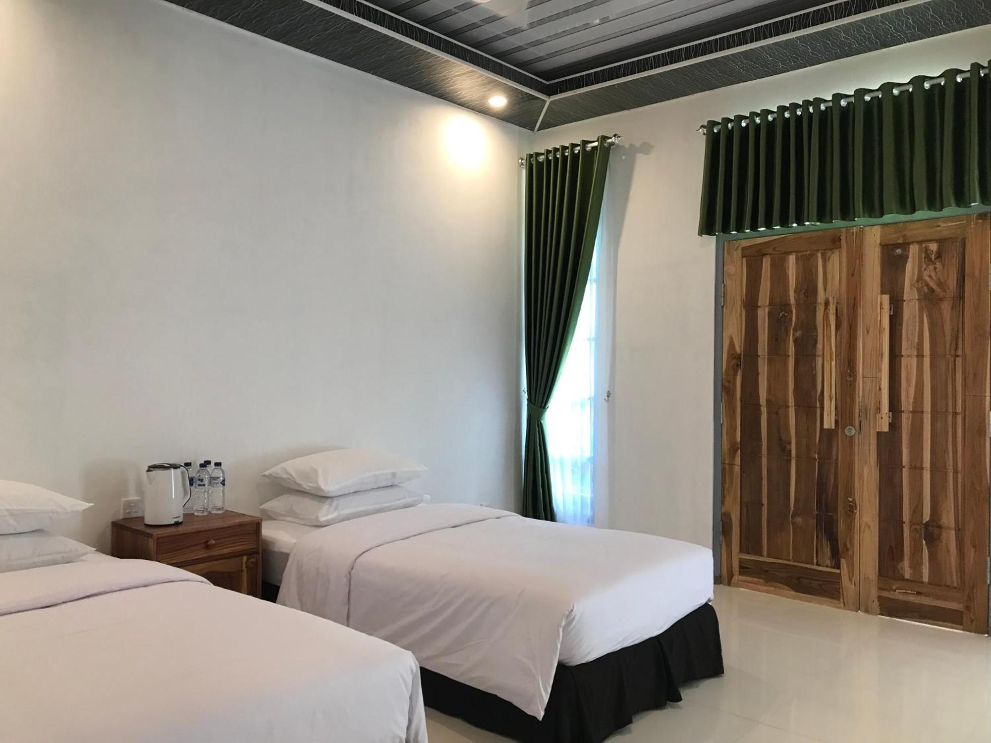 Pohon Purba Resort & Restaurant Labuhan Pandan Buitenkant foto